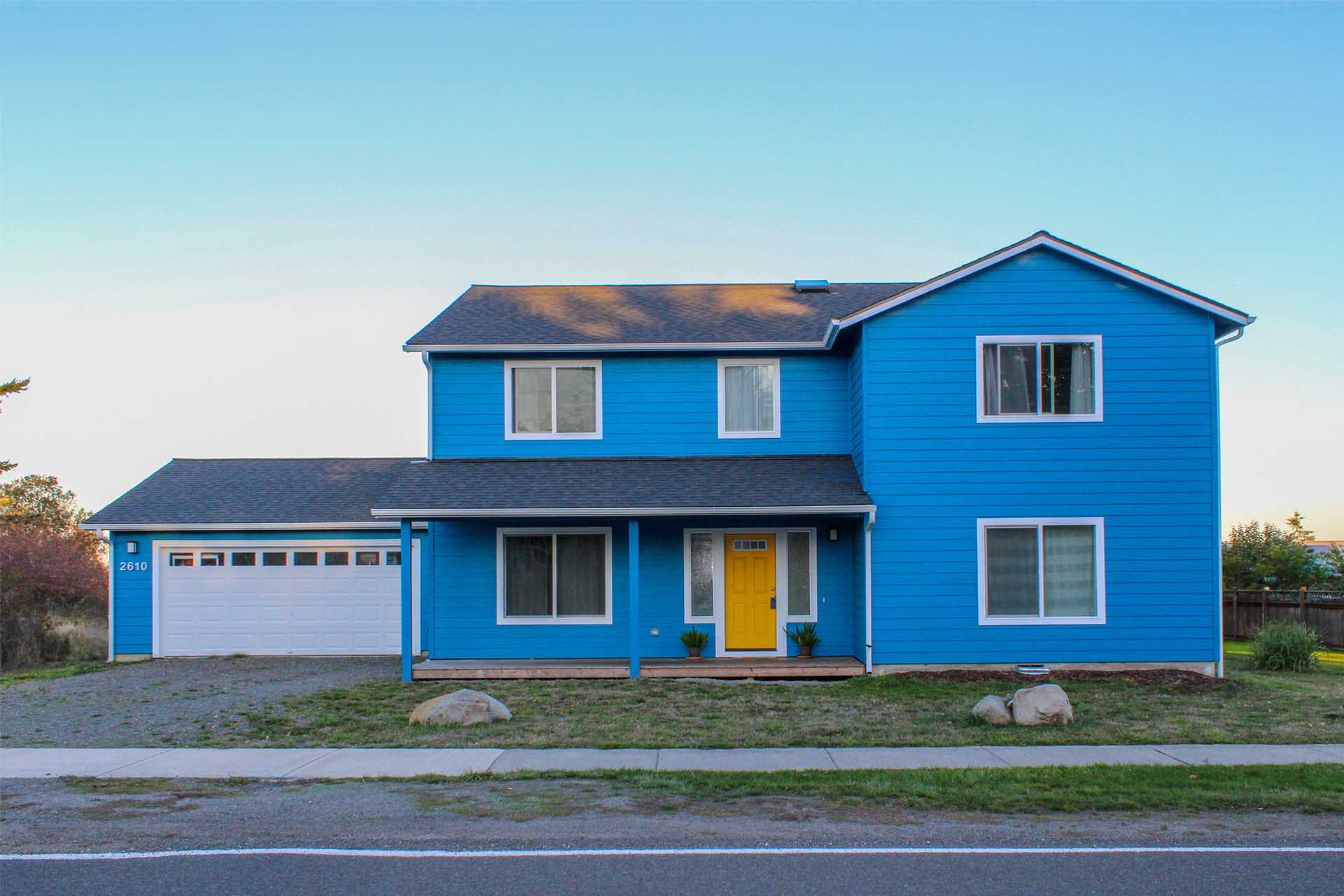 A beautiful blue two-story house for sale by owner